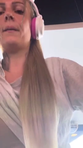 I worked out at the gym and felt warm, so I removed my t-shirt and bra, revealing my large, natural tits. porn video